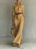 2026 Marca Independente Roupas Femininas Europeias e Americanas Outono Elegante e Sexy Vestido de Cor Sólida com Pregas Irregulares e Cinto