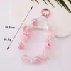 Cadena para teléfono de gato con pompón y cuentas para otoño e invierno, accesorio de muñeca moderno, accesorio para funda de teléfono de mujer, colgante llavero para bolso