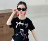 Traje de Verano para Niñas 2025 Nuevo Falda de Pastel Camiseta de Manga Corta para Niños de Moda Falda Plisada de Moda Conjunto de Dos Piezas Trendy