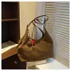 Bolso cruzado casual y sencillo para mujer, nuevo bolso tote de moda vintage otoño 2025, versión coreana bolso de hombro texturizado de color liso