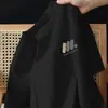 Camiseta Masculina Minimalista Moderna de Manga Curta, Estilo Americano Pesada de Corte Solto Algodão Puro Versátil Casual Manga Meia Manga Moda Masculina