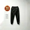 Pantalones de chándal de alta calidad, forrados de forro polar y engrosados para otoño e invierno, con un diseño moderno, adecuados para deportes y uso casual, y que proporcionan calidez. Nuevo estilo para hombre con puños elásticos