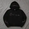 Sudadera Negra con Capucha de Moda Trendy 2026 para Mujer