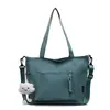 Bolso de hombro ligero, bolso de lona para commuting para mujer, nuevo bolso escolar de gran capacidad para estudiante universitario, bolso de mano al por mayor