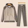 Nuevo traje informal Marca de moda Moda Primavera y Otoño Deportivo para mujer Sudadera con capucha Color sólido Traje de pantalones versátil