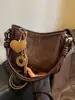 Bolso bandolera para mujer de gran capacidad 2026 nuevo estilo moderno sensación de alta gama bolso retro bolso de hombro único para mujer bolso tipo cubo versátil