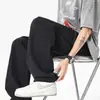 Pantalones casuales de malla transpirables estilo americano de marca moderna para hombre y mujer, pantalones largos deportivos finos, holgados, rectos, de pierna ancha, con diseño calado