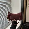 Bolso de mano retro para mujer 2026, bolso de hombro elegante y versátil con acabado texturizado