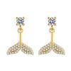 Pendientes de botón estilo frío, superventas, con temperamento, combinables, de sirena, para mujer, estilo coreano Dongdaemun, con cola de pez de celebridades de Internet.