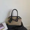 Bolso Vintage de Gamuza de Nicho 2026 Otoño/Invierno Nuevo Bolso Cruzado Versátil Bolso de Mano de Concha Moderno para Mujer