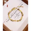 Pulseira de Peixe Dourado Pequeno com Moeda Banhada a Ouro em Latão, Design Exclusivo em Fio de Cobre Trançado Joia Atratora de Riqueza Que Não Desbota Facilmente