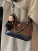 Bolso de Hombro con Cadena Texturizada para Mujer 2026 Nuevo Bolso Cruzado de Gran Capacidad Versátil Bolso Hobo para el Trabajo Bolso de Hombro Único Moderno