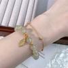 Pulsera de jade hetiano de alta gama, ligera y de lujo, con cuentas apiladas de doble capa y hojas de ginkgo y flor de durazno, estilo nacional vintage para mujer.