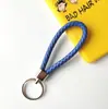 Llavero creativo llavero de cuerda de cuero cordón para llaves colgante de joyería cordón tejido fábrica de cuerda de cuero venta al por mayor
