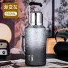 Nuevo termo vintage de alta gama con recubrimiento de titanio para la salud de hombres y mujeres, con alto valor estético, exquisito compartimento independiente para té, taza de titanio para uso doméstico