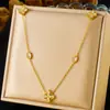 Collar de acero inoxidable con colgante de flor de cuatro pétalos y gota de agua de diamante de alta calidad, estilo retro francés, ligero y lujoso.