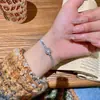 Pulsera Super Brillante con Circonita Microincrustada para Mujer, Pulsera de Cristal de Lujo Ligero de Gama Alta, Nueva Joyería Popular de Venta al por Mayor 2026