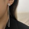 Aretes largos elegantes y elegantes de lujo ligero con borla de estrella de cinco puntas de diamantes de imitación súper brillantes, joyería para la oreja de estilo frío de alta gama a la moda