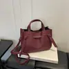Bolsa de Ombro Transversal Elegante Versátil Simples de Luxo com Padrão Lichia Nova Moda Verão 2026