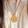 Nuevo colgante del Zodiaco estilo chino hecho de latón, microincrustado con diamantes, cadena para suéter para mujer, estilo nacional, nuevo diseño de moda, único y minimalista