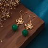 Original retro estilo chino Hanfu método antiguo chapado en oro nudo chino calcedonia hueca trébol de cuatro hojas temperamento antiguo pendientes verdes