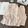 Pijamas de mujer al por mayor para exportación, conjunto lindo de dibujos animados estilo coreano, holgado, de manga larga, delgado, para casa, para niñas jóvenes, primavera y otoño