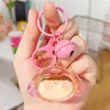 Mini Cabeza de Perro de Acrílico Lilith Llavero de Arena Líquida Muñeca Linda Colgante Destellante Llavero de Regalo