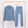 Conjunto de jaqueta com gola alta e calça cropped da marca LULU DF, em estoque, entrega direta, justo, respirável, elástico, com zíper dourado