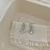 Pendientes Minimalistas Únicos y Sofisticados con un Toque de Alta Gama, Presentando una Personalidad Pequeña, Sencilla, Moderna, Versátil y Adornados con Diamantes y Borlas de Gota de Agua