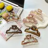 Jiayue Joyería Diseño Simple Versátil Estilo Nube Hueco Pinza Tiburón Parte Trasera de la Cabeza Pasador Accesorio para el Cabello