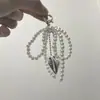 Estilo Ins Colgante de Llavero con Colgante de Corazón y Lazo de Perla Decoración para Bolso Colgante DIY Nicho Elegante Colgante Transfronterizo