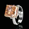 Otoño e invierno nueva joyería cobre chapado en oro diamante de alto carbono diamante cuadrado flor de hielo cobre incrustado princesa cuadrado anillo de lujo mujeres 12*12