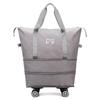 Bolsa de equipaje al por mayor tela Oxford gran capacidad expandible rueda universal bolsa de viaje compras diarias mochila portátil