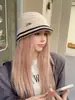Nuevo sombrero de lana para mujer otoño e invierno moderno todo-partido moderno sombrero de pescador tejido sombrero de cubo cálido sombrero de cubo pequeño que estiliza la cara