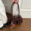 Bolso de mujer único de nicho estilo coreano, nuevo modelo primavera 2026, exquisito y elegante, bolso de hombro y bandolera simple y casual