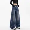 Jeans retro americanos rasgados con dobladillo curvo para mujer, diseño de primavera/verano, corte holgado, adelgazantes, pantalones de pierna ancha hasta el suelo tipo guadaña