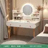 Tocador moderno y minimalista para dormitorios, una mesa de tocador pequeña adecuada para apartamentos pequeños, un tocador elegante y lujoso para niñas