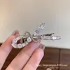 Presilha de cabelo elegante e versátil em formato de laço com strass branco, requintado acessório de cabelo torcido em linha reta
