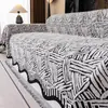 Una funda de sofá completa de una sola pieza, tela de una sola pieza, adecuada para todas las estaciones, lujo ligero, sensación de alta gama, de tres plazas, una chaise longue, chenilla