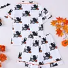 Pijama infantil de estilo europeo y americano transfronterizo, con solapa, estampado de Halloween, manga corta, tejido ignífugo, conjunto transpirable para casa al por mayor