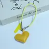 Estilo minimalista Huayang colgante de corazón de cuero correa para teléfono cordón de PU colgante accesorio de bolso correa de muñeca correa de transporte portátil
