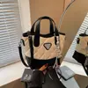 Bolso de cubo de mano de moda transfronterizo, nuevo estilo verano 2026, versátil y elegante, bolso de hombro y bandolera de alta gama de moda