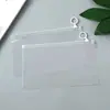 En stock bolsa con cierre de cremallera y lengüeta de PE transparente bolsa autosellable de plástico con anillo redondo esmerilado bolsa de almacenamiento de alta transparencia apertura autosellable empaque