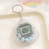 Máquina electrónica de mascotas mini de mano más vendida, máquina de juego de mascotas virtuales, llavero, colgante de regalo pequeño creativo