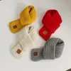 Bufanda de invierno para niños explosiones tejida color liso bufanda cálida de invierno en stock al por mayor bufanda nueva para niñas Joker