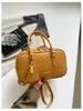 Bolso de mano Boston para mujer de nicho, bolso de hombro 2026, nuevo bolso cruzado tejido casual de moda, bolso tipo almohada versátil