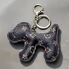Venda Direta de Fábrica Transfronteiriça Pingente de Bolsa de Cachorro Desenho Animado Moda Criativa Couro PU Pingente Chaveiro de Carro de Cachorro