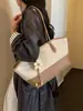Bolso de axila de alta gama para mujer transfronterizo, nueva moda otoño 2026, bolso popular para la oficina y el trabajo, bolso tote versátil