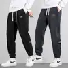 Pantalones de chándal de pana de peso pesado para otoño para hombre, pantalones casuales de retazos, corte holgado moderno, pantalones jogger versátiles, modernos