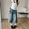 Elegantes pantalones capri de mezclilla lavada de corte holgado que cubren las caderas, modernos y versátiles, fáciles de combinar, de cintura alta, ajustados y que alargan las piernas.